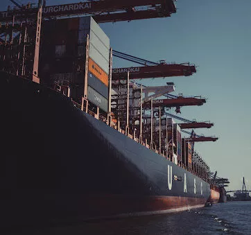 A large cargo ship in a port