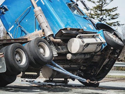 The underside of a big truck as it is righted after an accident