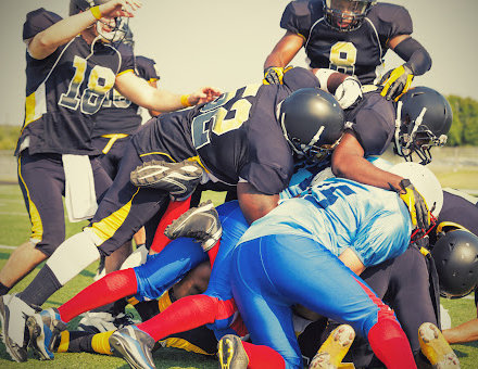 Repeated blows to the head, can lead to football brain injuries.