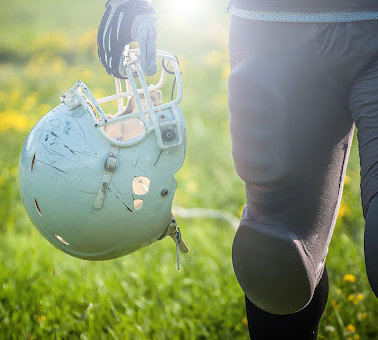 Proper protection like helmets can help reduce, but not eliminate, football brain injury.
