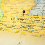 Louisiana pinned on a paper map