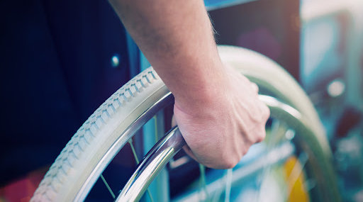 Closeup of someone using a wheelchair