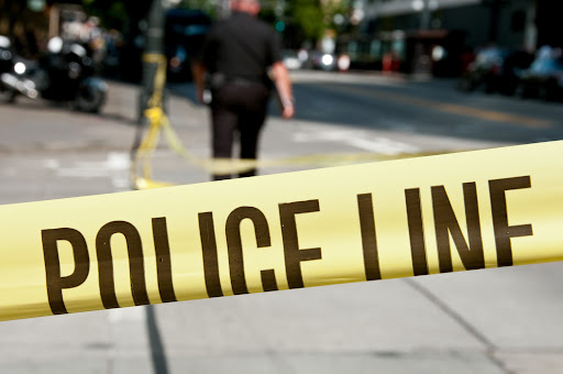 Police tape. A police report can help your car accident lawyer make a case.