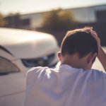 Young-Man-Distraught-After-Car-Accident