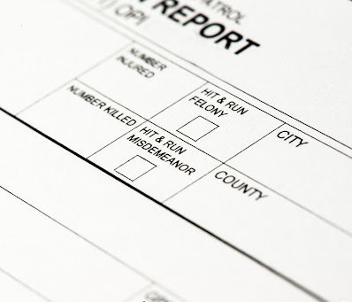 A traffic incident report with boxes for Hit & Run accidents