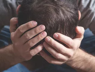 Caucasian depressed man at home. Mental health