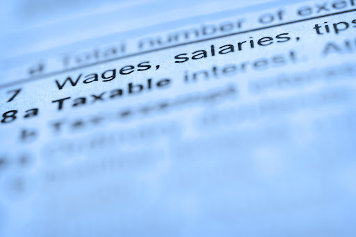 Close up of "Wages & Salary" line from US tax form 1040.