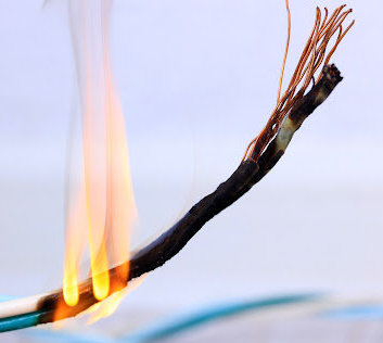 A defective electrical wire burning