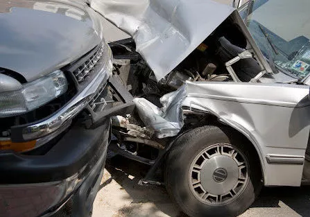 A closeup of two damaged cars after an accident in Lafayette