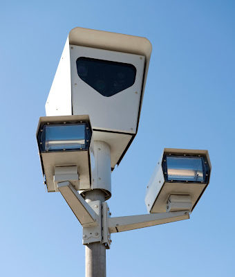 White speed cameras