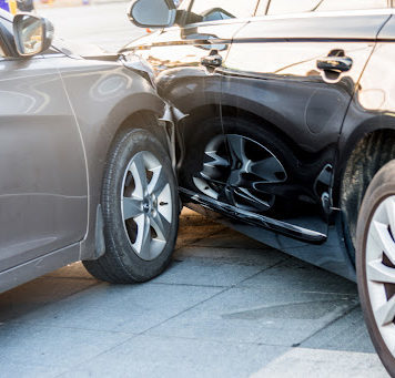 A black car and silver car after an accident in Denham Springs, Louisiana