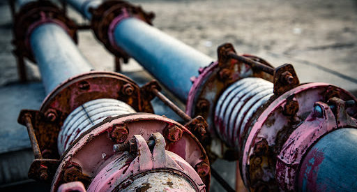 A pair of aging and worn oil pipelines