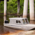 Aluminium fishing boat in a swamp in Louisiana, United States