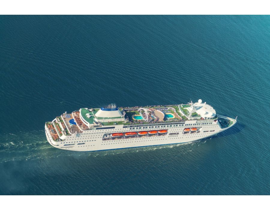 cruise ship with guests on lido at sea