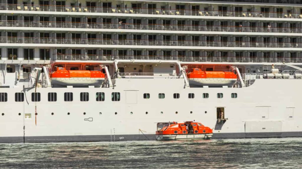 life boat deployed from cruise ship