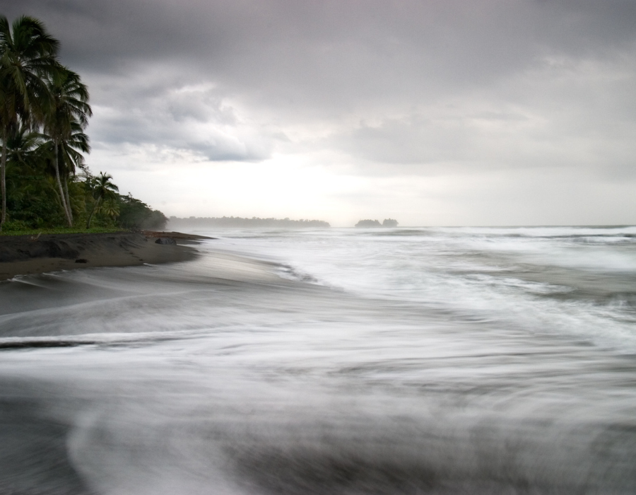 eery skies and storm brewing with waves and maelstrom