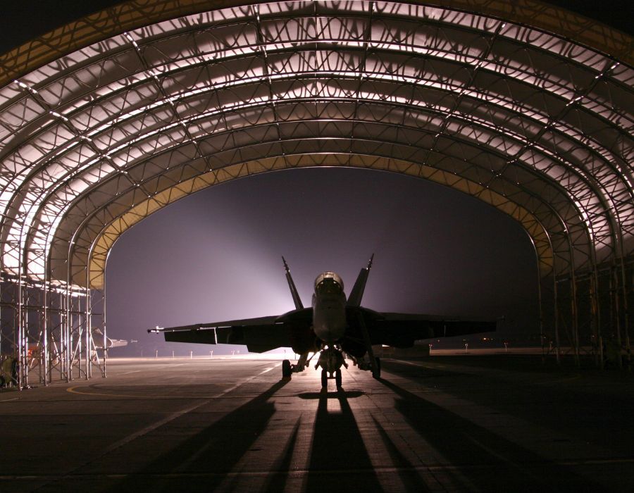 military aircraft in airport bay