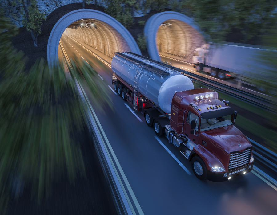 tanker truck driving out of tunnel