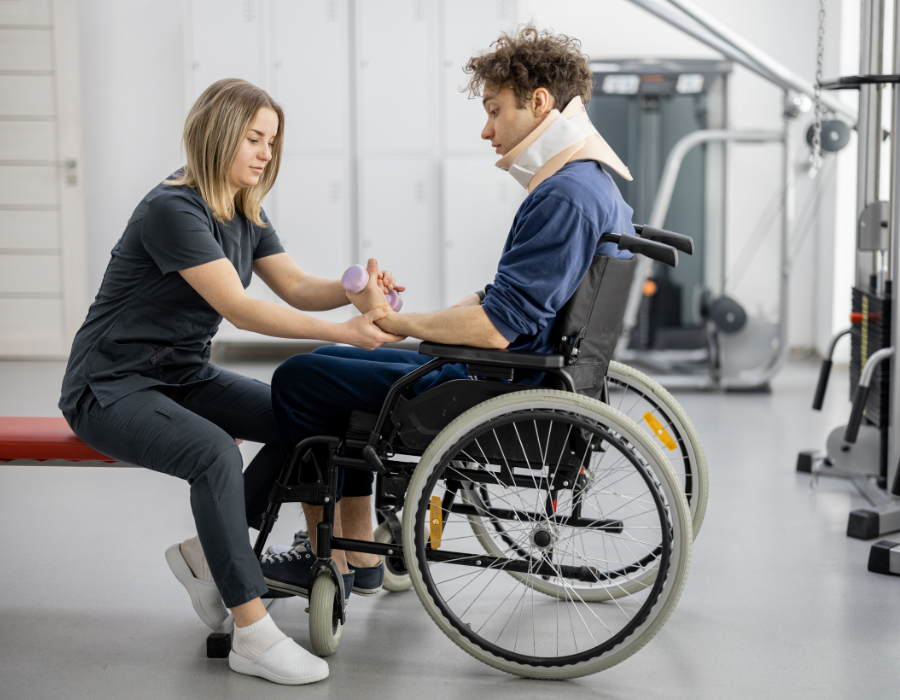 healthcare worker helping patient suffering from paralysis