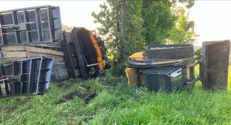 heavy equipment fallen off truck