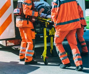 first responders loading someone in an ambulance - Baton Rouge Catastrophic Injury Lawyer