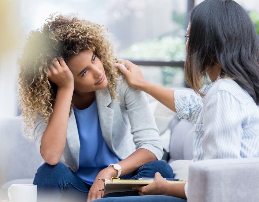 doctor consoling patient suffering mental distress after car accident