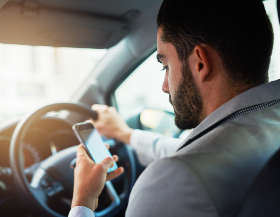man on phone distracted while driving