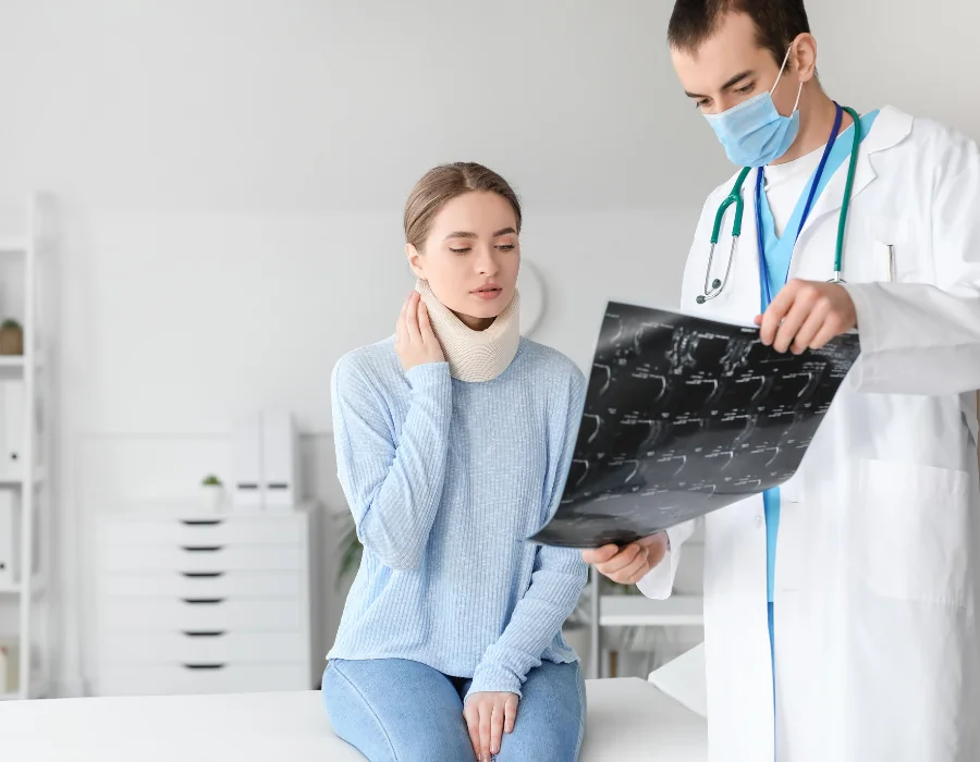 woman being shown xrays from doctor