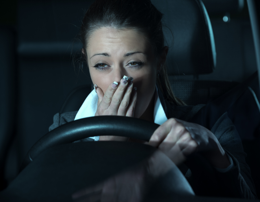 woman tired while driving