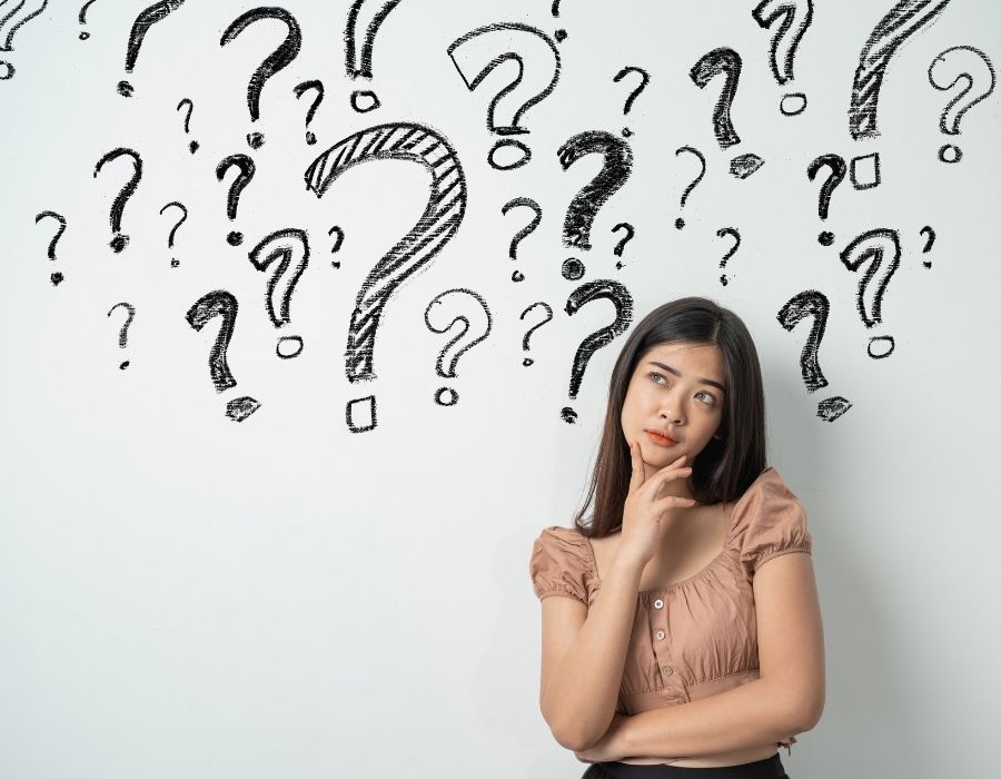 Questions to Ask A Personal Injury Lawyer, woman thinking about questions