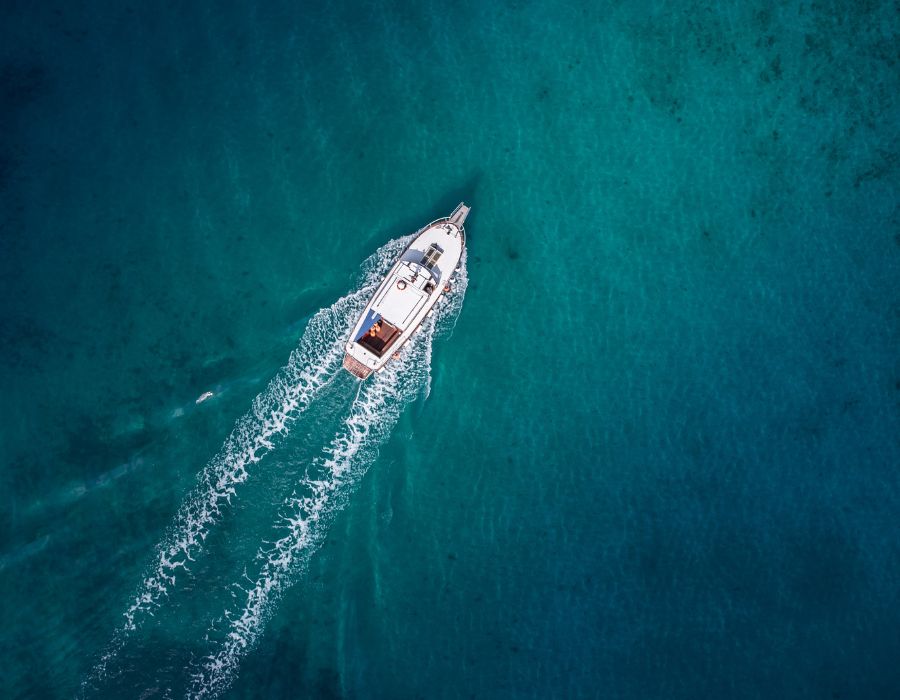 boat gliding across lake