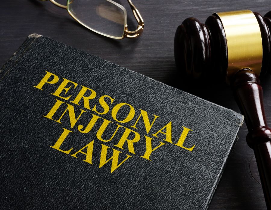 personal injury law book and gavel