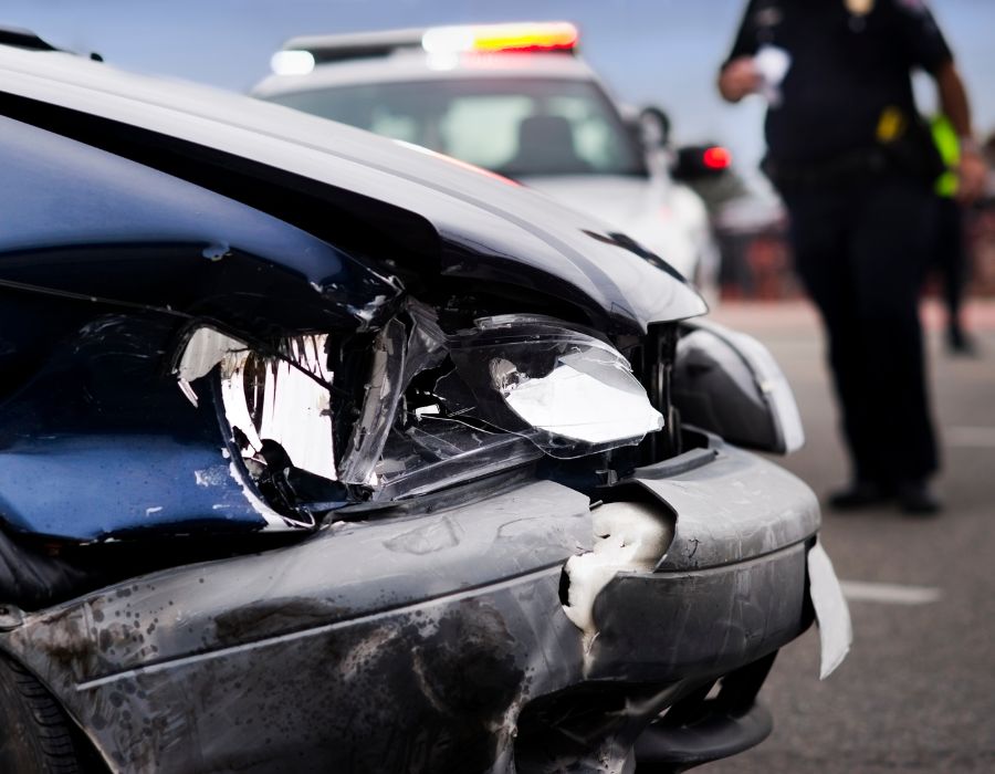 police arriving on scene of a car accident