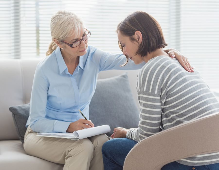 woman comforting family member