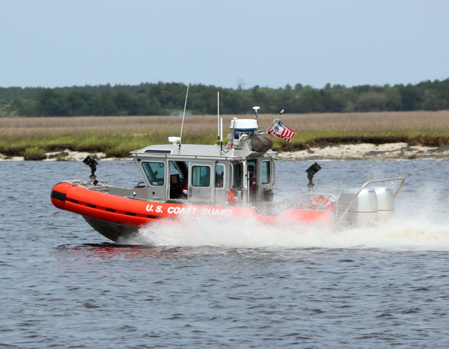 coast guard boat responding to boat accident