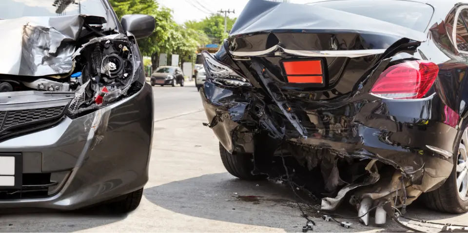 Cars smashed in back bumper