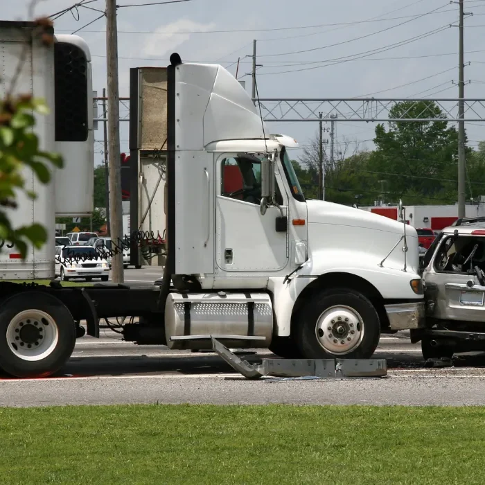 1719642691_crash scene involving a commercial truck and passenger vehicle 1719642691_crash scene involving a commercial truck and passenger vehicle