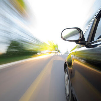 Close-up of speedy on car road. Close-up of speedy on car road.