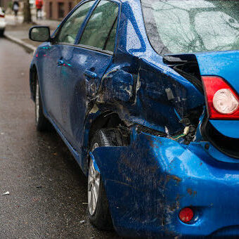 Hit and run involving a parked car on a city street