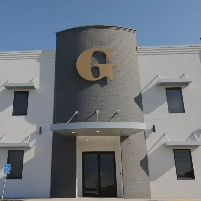 Exterior Image of Lafayette Office, large gold G on Black bricks