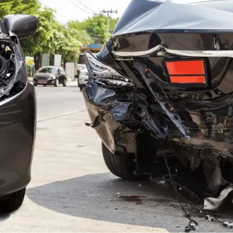 Cars smashed in back bumper