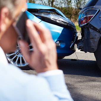 Man-Calling-in-Fender-Bender