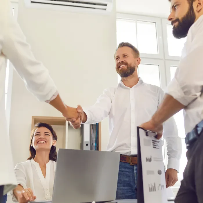 Monroe personal injury compensation lawyers and client shaking hands
