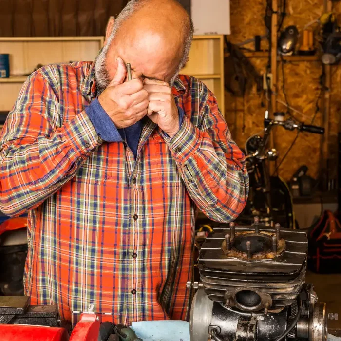 eye injury attorney - man with eye injury holding his eye