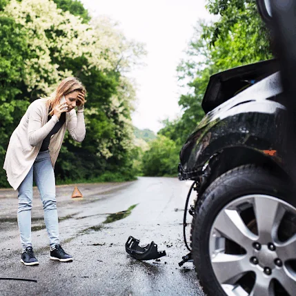 Woman-on-Phone-After-Car-Accident Woman-on-Phone-After-Car-Accident