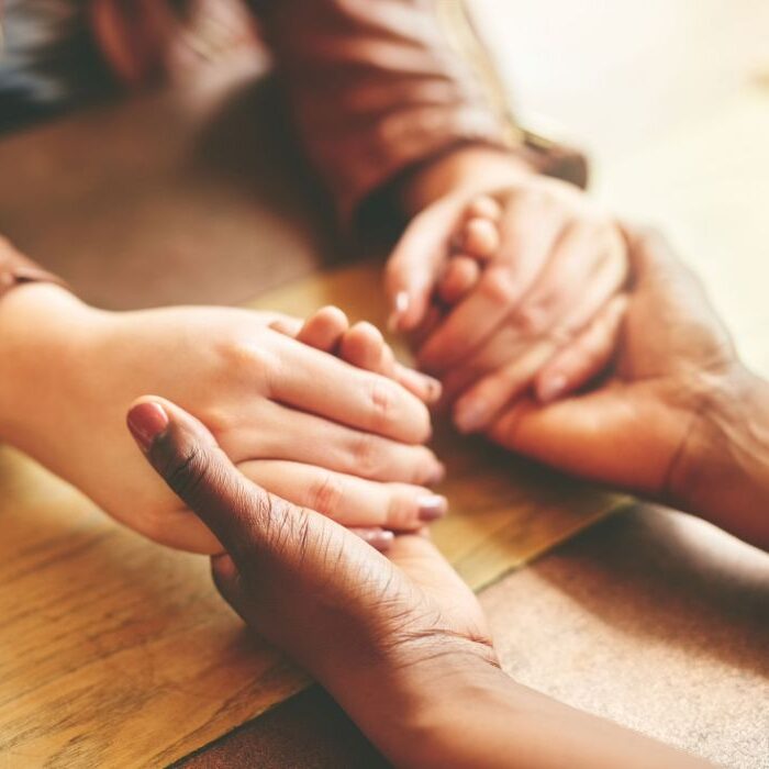 family holding hands after death family holding hands after death