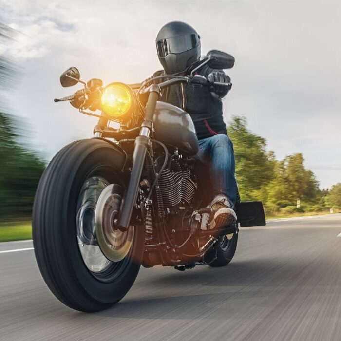 man riding motorcycle man riding motorcycle